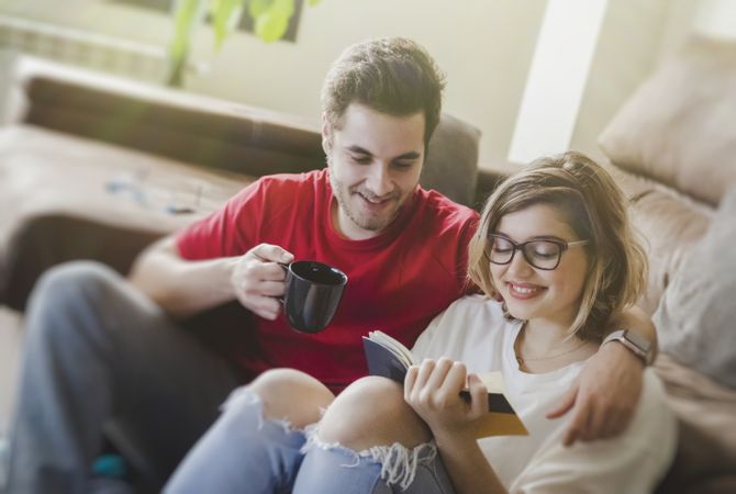 Couple sitting at couch together