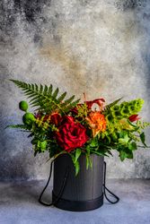 Red and orange summer flower composition
