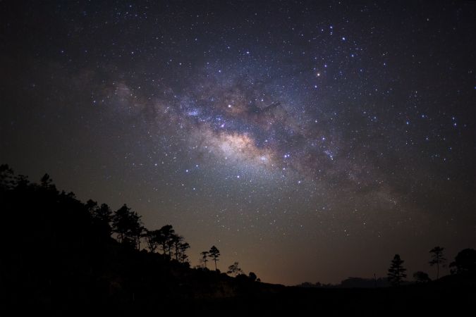 Landscape silhouette of tree with milky way galaxy and space dust in the universe, Night starry sky with stars