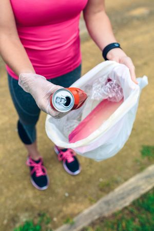 Woman showing garbage