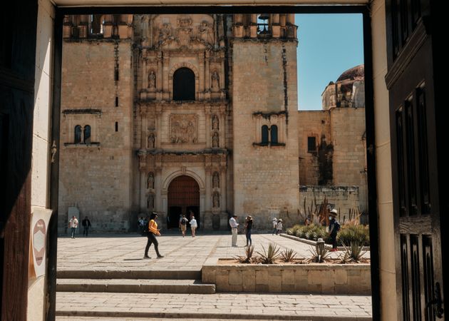 People in courtyard of church in Oaxaca