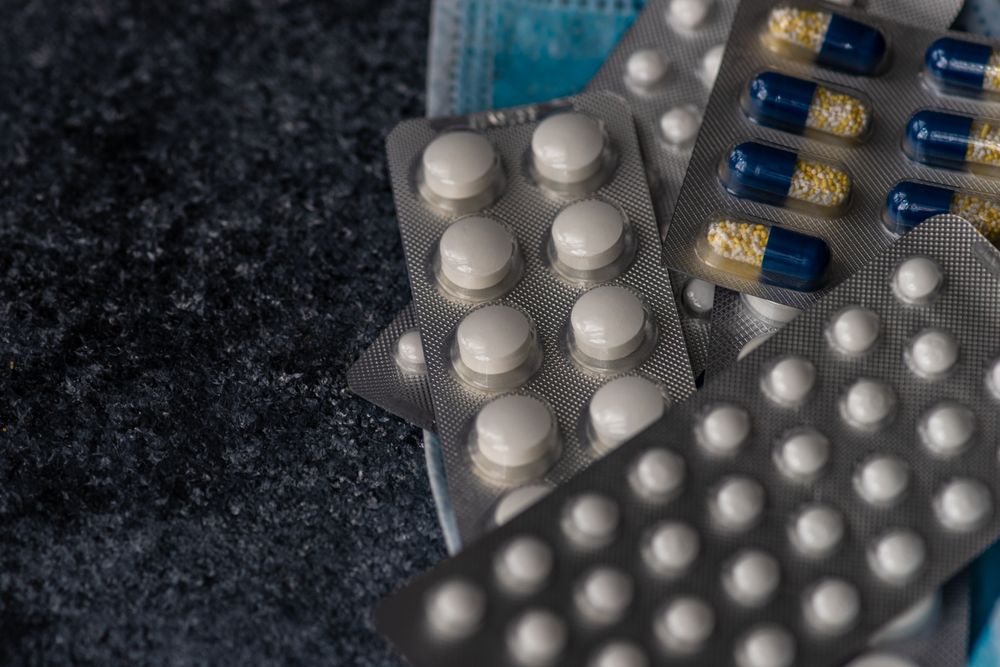 Top view of different pills on counter