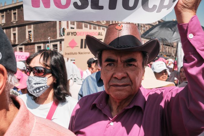 Mexico City, Mexico - February 26th, 2022: Man in leather cowboy hat at protest in Mexico City