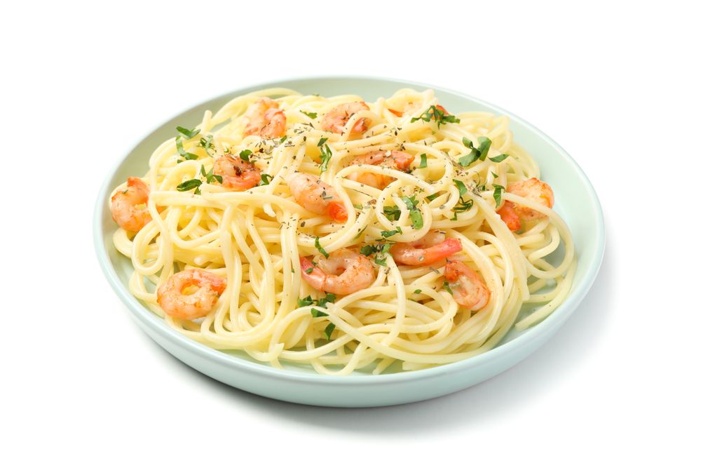 Plate with tasty pasta isolated on plain background