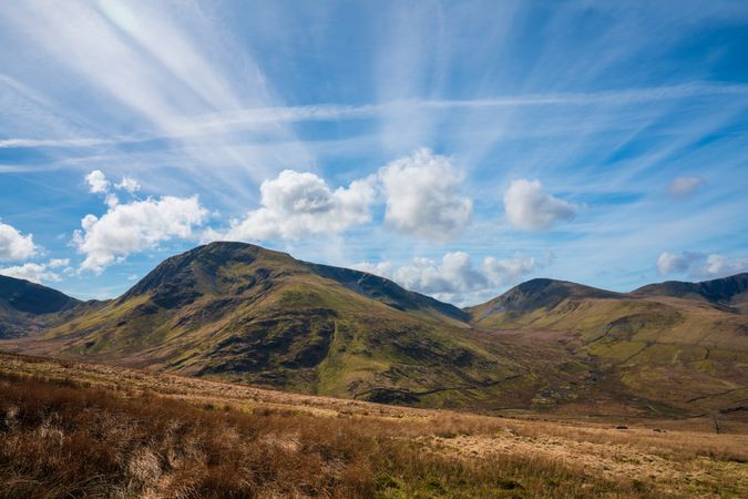 Majestic mountains range in clouds