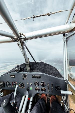 Aerial view from inside the cockpit of a small plane