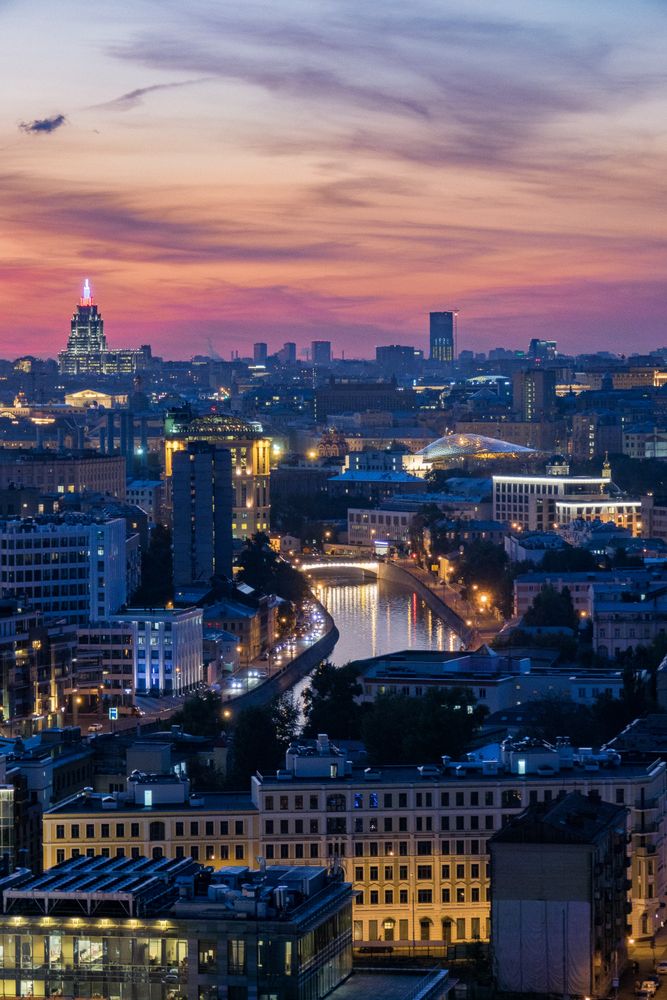 Aerial view of city during sunset