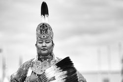 Red Wing, MN, USA - July 8th, 2017: Sioux woman standing tall in headdress
