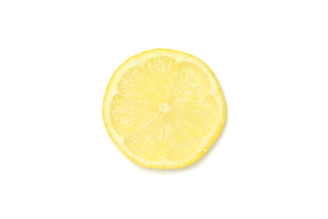 Lemons slice isolated on light background. Ripe fruit