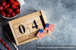 Independence Day celebration snack of strawberries on grey counter with copy space beXqn3