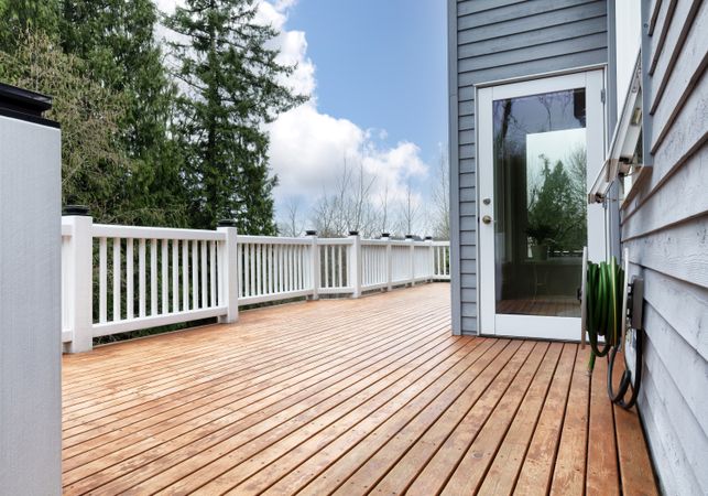 Freshly stain large home walk out cedar wood deck patio