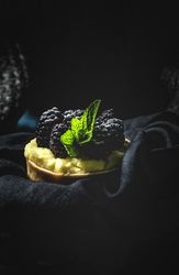 Homemade small cake with blackberries
