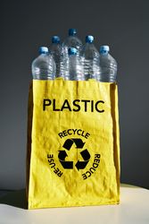 Used plastic bottles in bright bag