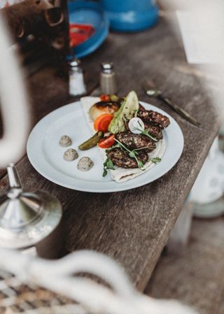arabic kebab plate with vegetables