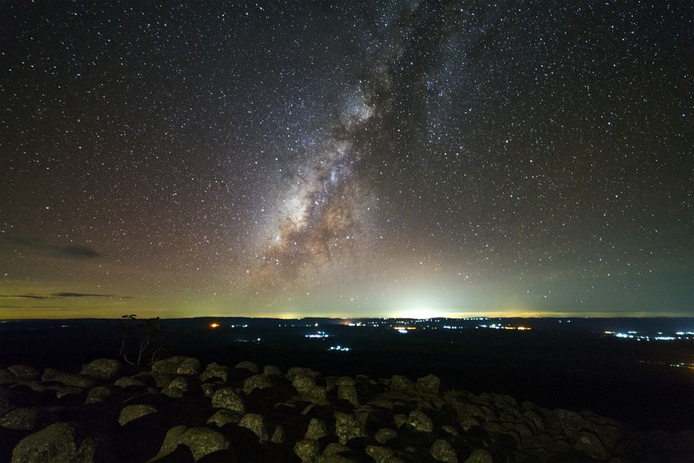 Milky way galaxy with knob stone ground is name Lan Hin Pum viewpoint at Phu Hin Rong Kla National Park in Phitsanulok, Thailand