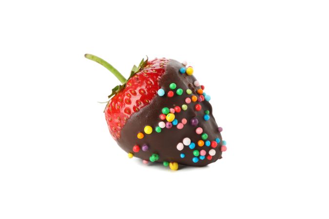 Chocolate fondue. Strawberry in chocolate isolated on plain background
