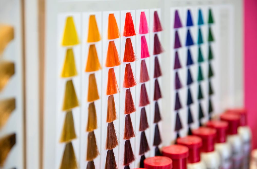Color swatches for hair dye on wall