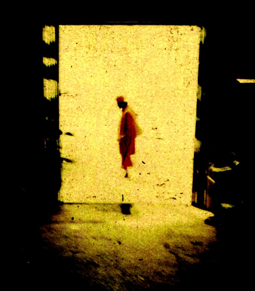 Silhouette of man in doorway in India