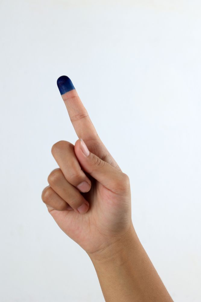Female Showed Hand with Ink for Indonesian Election Day or Pemilu, Little Finger Jari Tinta