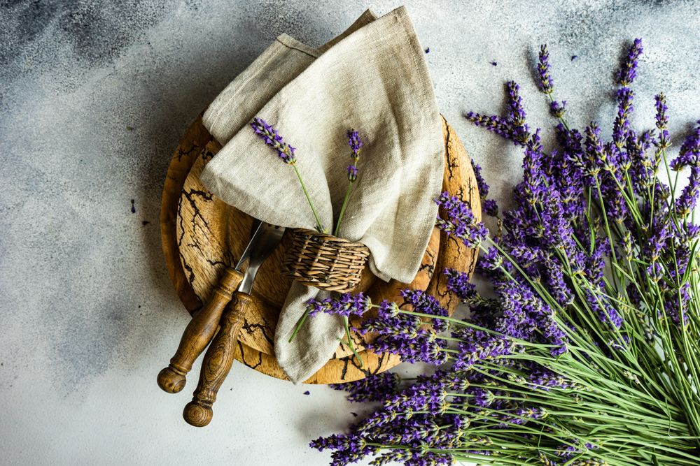 Summer table setting with bunch of lavender flowers