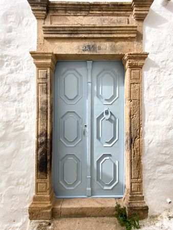 Patmian blue door with Irregular octagon mouldings