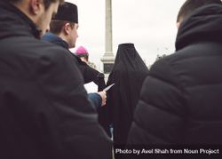 London, England, United Kingdom - March 5 2022: Back shot of group of religious men at protest 4AOV80