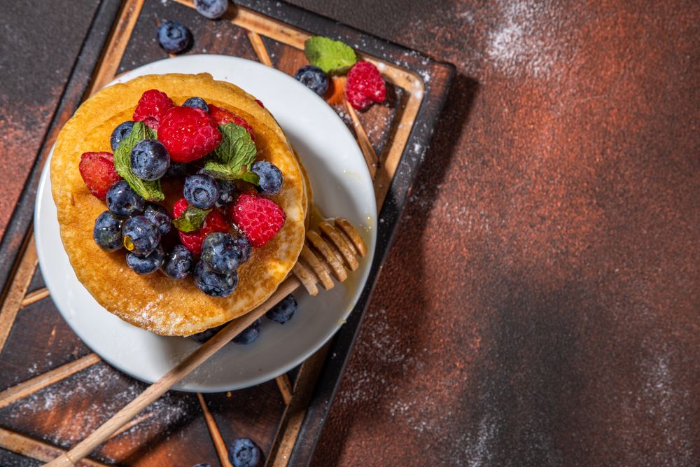 Stack of pancakes with berries