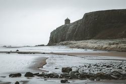 Old temple located on cliff in Northern Ireland coast