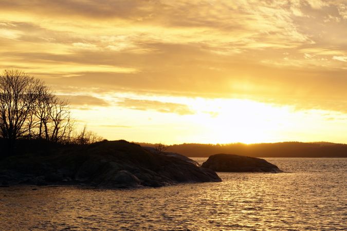 Peaceful seashore lake at sunset