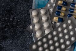 Top view of different pills on counter