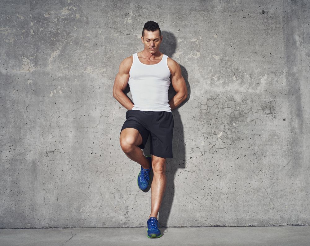 Muscular and fit man relaxing after workout