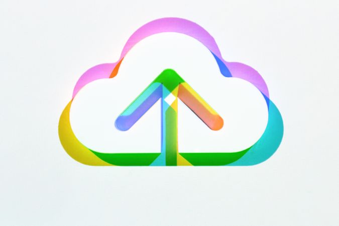 Multicolored cloud upload icon