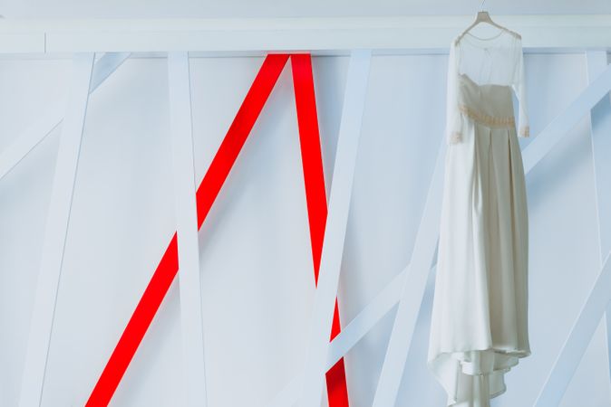 Wedding dress hanging on hanger