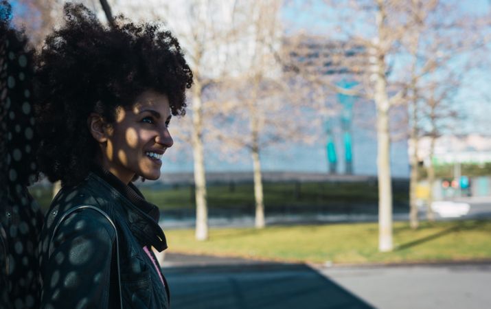 Portrait of Black woman with afro hair.