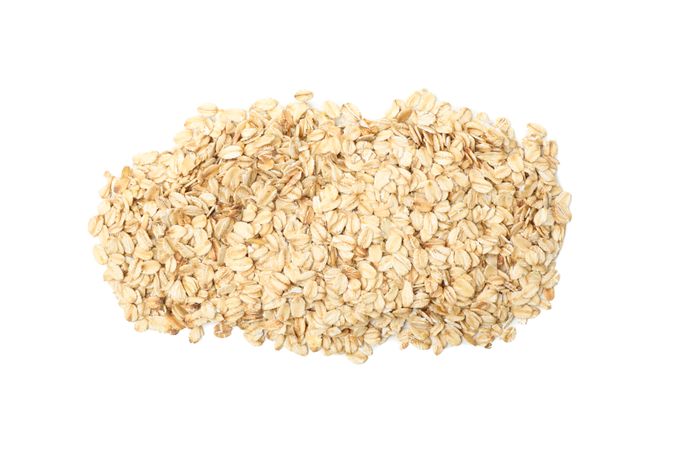 Oatmeal flakes bunch isolated on blank background