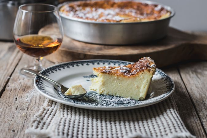 Cottage cheese pudding and glass of cognac