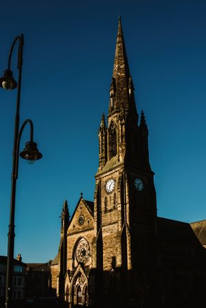 View of historic stone church in Yorkshire, England in sunny day