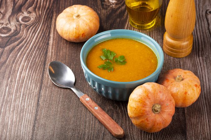 Delicious homemade pumpkin soup in bowl.