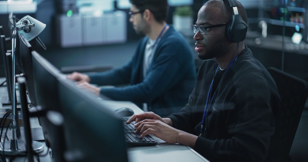 Young Black Specialist Working in Advanced Technology Industry
