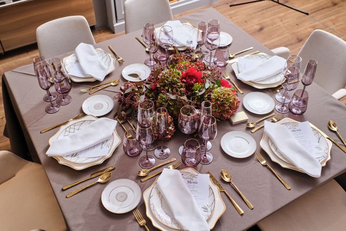 Banquet table with plates and glassware