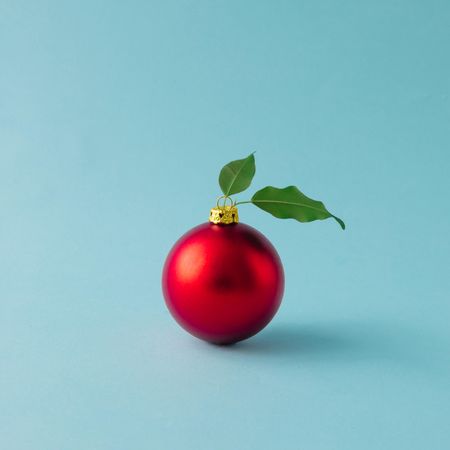 Apple made of red Christmas bauble and leaves