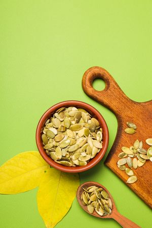 Cooking ingredients for fall season - pumpkin seeds, pumpkin