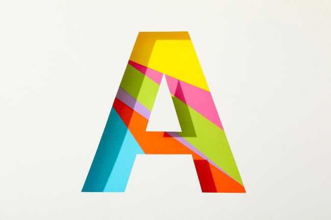 Multicolor letter A on blank background, space for text