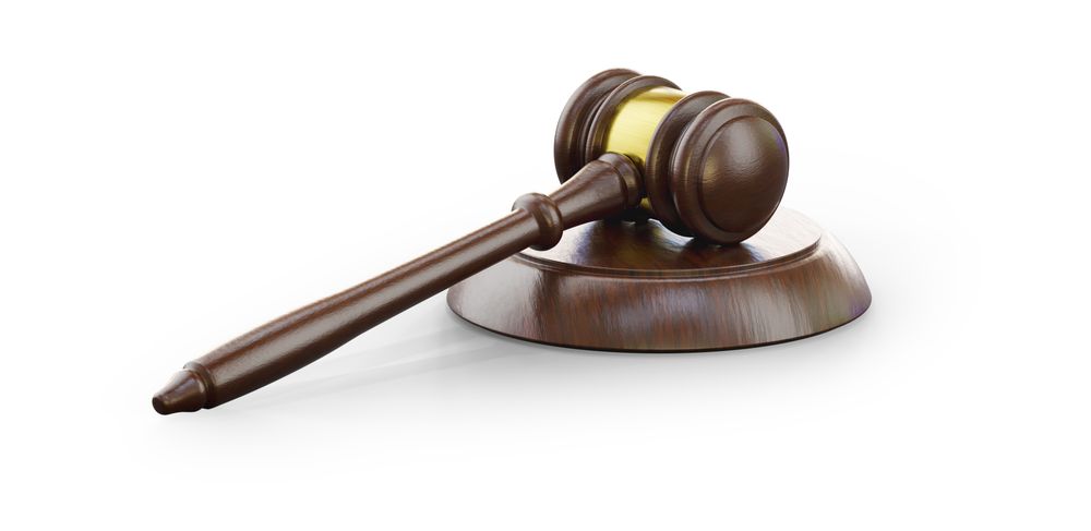 Wooden Gavel on plain background