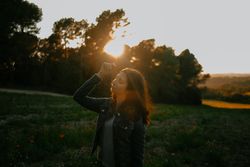 Woman walking on meadow and enjoying freedom