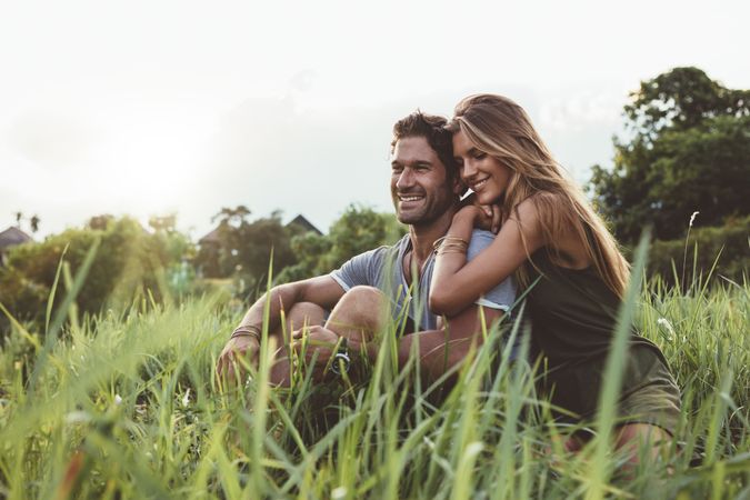 Happy young couple in grass