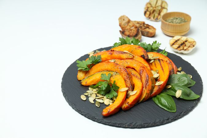 Concept of tasty homemade dish - baked pumpkin