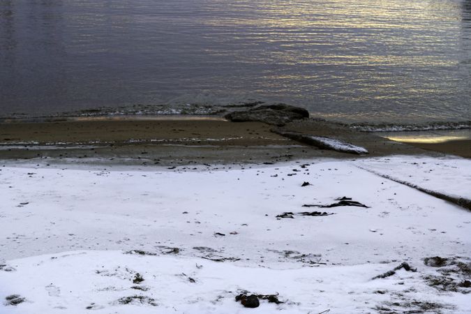 Empty winter seashore covered with snow