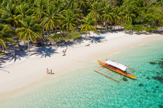 Aerial view of tropical island with blue water