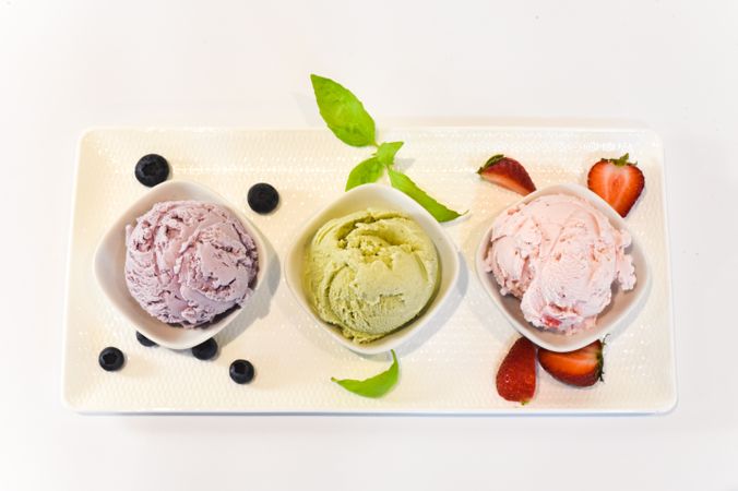 Flight of three different ice cream scoops